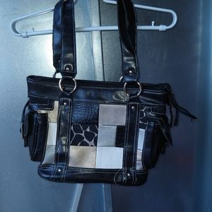 Patched leather bag